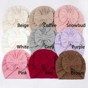 Collection de bonnets turbans extensibles pour bébés en neuf couleurs variées
