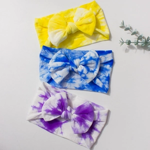 Set of 3 tie-dye baby headbands with large bows in yellow, blue and purple cotton