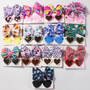 Set bandeau bébé et lunettes cœur avec 13 motifs variés pour protection solaire élégante