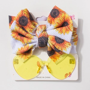Ensemble bandeau bébé et lunettes cœur avec nœud tournesol et verres jaunes