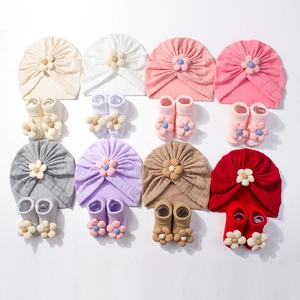 Infant turban hat and socks set with 3D floral accents in eight vibrant colors