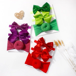 9-piece baby headband set with sequin bows and elastic bands in purple green and red