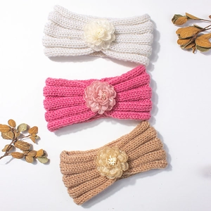 Set di tre fasce in maglia per neonati con fiori nei colori bianco, rosa e kaki