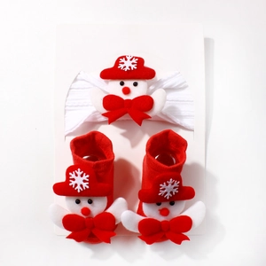Cute Christmas baby headband and socks set with festive snowman charms in red and white