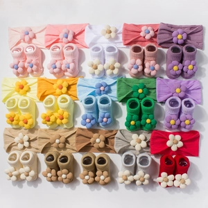Baby headband and sock set featuring fabric flowers in 15 vibrant colors for infant girls