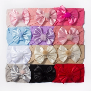 Lot de 12 bandeaux pour bébé avec grands nœuds en satin et pompons en peluche doux