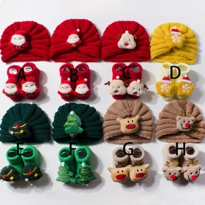 Christmas baby knit hat and socks set featuring cute cartoon holiday icons and warm fabric