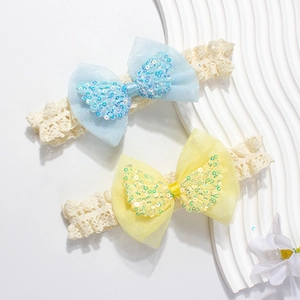 Fasce neonata in pizzo elastico con doppi fiocchi in mesh nei colori azzurro e giallo