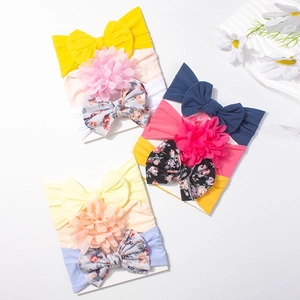 Set of 9 elastic baby headbands with colorful bows and floral designs for infants