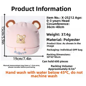 Pink infant beanie with bear ears and embroidery showing size and fabric details