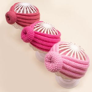 Bandeaux d'hiver tricotés pour bébé avec nœud donut en trois nuances de rose doux