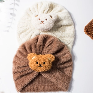 Plush baby turban hats with cute bear patch in beige and brown colors for winter