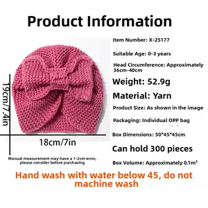 Pink knit baby beanie detail with size specs and washing instructions for infants