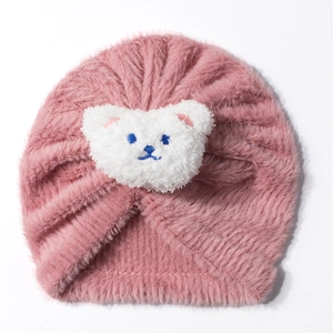Pink plush baby turban hat with cute teddy bear ornament for autumn and winter warmth