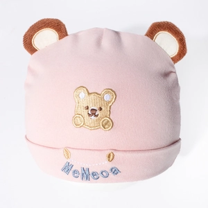 Soft pink cotton baby beanie with cute bear ears and embroidery for newborn warmth