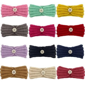 12-pack of soft knitted baby headbands with pearl flower accents in various colors