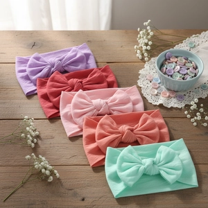 Ensemble de 5 bandeaux bébé élastiques en nylon avec grands nœuds faits main aux couleurs douces