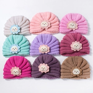 Collection de bonnets turban tricotés pour bébé avec fleurs souriantes en neuf couleurs
