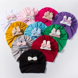 Baby fleece-lined turban hats with 3D rabbit decor in ten vibrant assorted colors