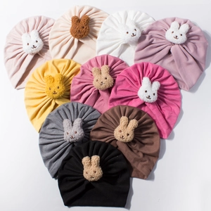 Infant knotted beanie hats in 10 colors with plush bunny decor for autumn winter