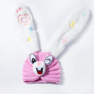 Pink knitted baby hat with long plush bunny ears and cute cartoon embroidery