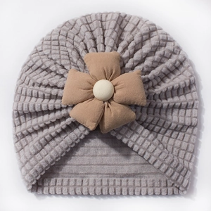 Infant waffle knit turban hat in dusty purple with a decorative 3D flower detail