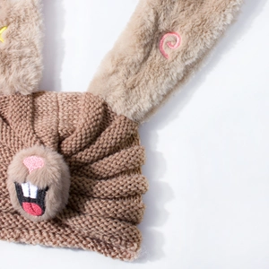Brown knitted baby winter hat featuring cute plush rabbit ears and embroidered bunny face