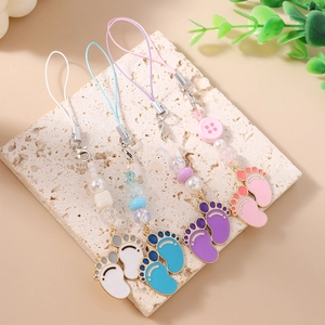 Set of four colorful baby footprint charms with matching beads for phones and bags