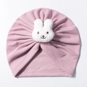 Pink newborn turban hat with soft plush bunny ears and warm knit fabric design