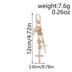Detailed size chart for golden beaded keychain featuring rhinestone cross charms