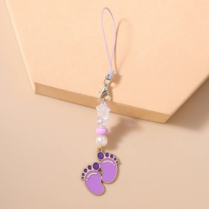 Detail of purple bead phone charm with enamel foot pendants and silver lobster clasp