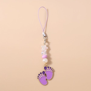Detailed close-up of purple beaded phone charm with two purple enamel footprint pendants