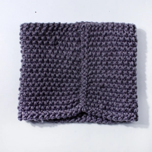 Detail of soft purple knitted baby neck warmer scarf with premium textured knit material