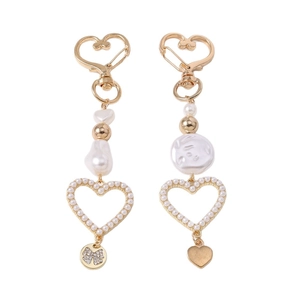 Elegant gold heart keychain featuring baroque pearls and heart pendant on white background