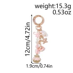 Detailed dimension chart for starfish pearl keychain showing 12cm length and 15.3g weight