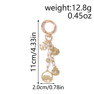 Détails et dimensions du porte-clés nautique avec étoile de mer, ancre et perles