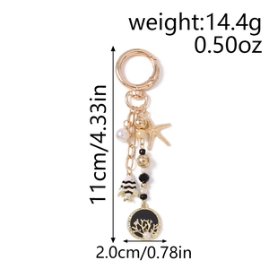 Détail du porte-clés étoile de mer et arbre de vie avec dimensions 11cm par 2cm et poids 14,4g