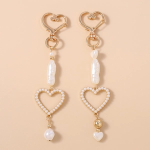 Elegant Heart Shaped Artificial Baroque Pearl Keychain Gold Alloy Hollow Heart Bag Charm Jewelry For Women Gift