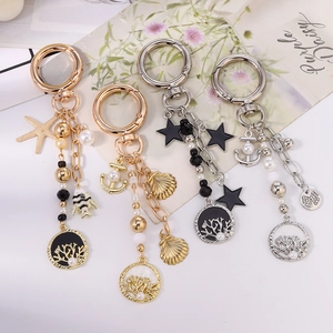 Porte-clés de mode étoile de mer et ancre avec perles et coquillages dorés et argentés