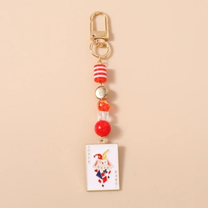 Detail of beaded Joker keychain with rabbit enamel charm and colorful geometric beads