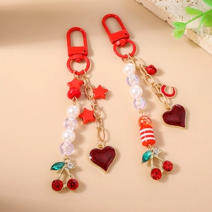 Beaded cherry star keychain with red heart and gold chain for bags and purses