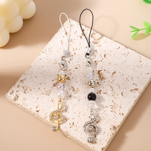 Fashion pearl beaded phone charms with rhinestone music notes in gold and silver finish