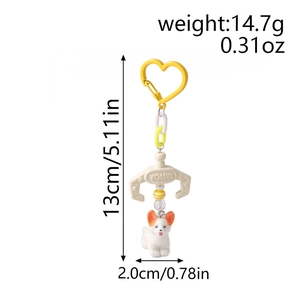 Detail view of plush dog keychain with dimensions 13cm and heart carabiner hook