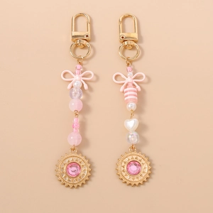 Porte-clés Femme Rose avec Perles Nœud et Soleil en Alliage de Zinc Strass Perle Artificielle Pendentif de Sac Style Doux Girly