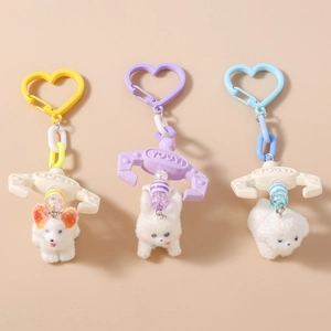Creative plush puppy claw machine keychain set in pastel yellow, purple and blue