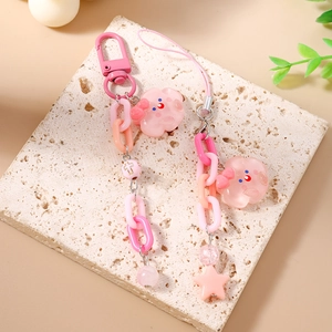 Bijou de téléphone chaîne rose avec charms étoile et nuage sur support en pierre