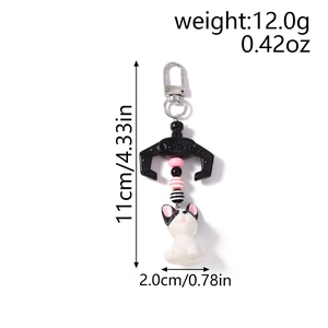 Detail view of cartoon French Bulldog keychain with dimensions 11cm x 2cm and beads