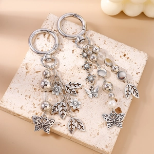 Bohemian retro silver keychain set with metal butterflies, leaf charms and beads