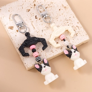 Creative mechanical claw keychain with cute French Bulldog charm for bags and purses