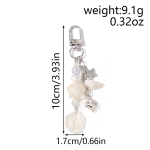Detail of seashell heart keychain with beads showing 10cm length and 9.1g weight specs